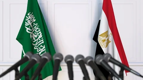 Flags of Saudi Arabia and Egypt at international meeting or negotiations press Stock Footage 86380751