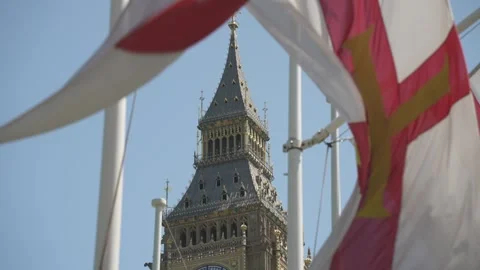Flags of St George and Big Ben Clocktower, Westminster, London, England Stock Footage 243035987