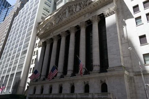 Flags at the stock exchange building Stock Photos