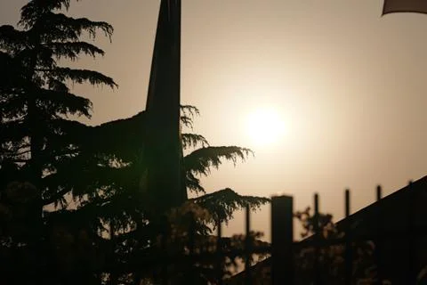 Flags at Sunset with No Wind Fotos de archivo