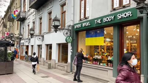 Flags in support of Ukraine are seen in Tbilisi, Georgia, amid the war 4K Stock Footage 171332724
