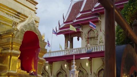 Flags sway in the wind at a temple in Northern Thailand Video stock 221720705