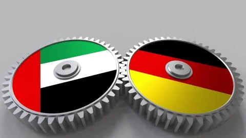 Flags of the UAE and Germany on meshing gears. International cooperation 스톡 일러스트