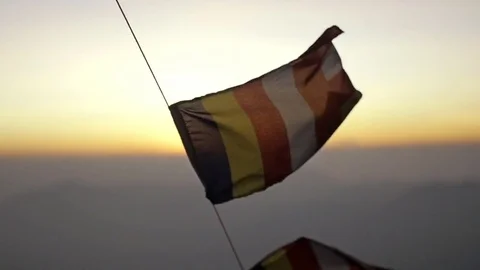 Flags under Adam's Peak in Sri Lanka Stock Footage 73288652