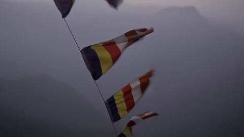 Flags under Adam's Peak in Sri Lanka Stock Footage 73288979