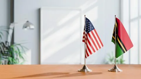 FLAGS OF USA AND VANUATU ON TABLE Stock Photos
