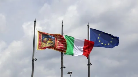 Flags of Veneto Region, Italy and European Union waving in the wind Stock Footage 282578053