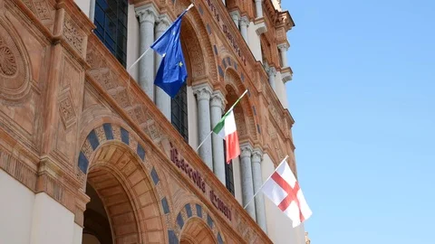 Flags wave on the facade of the Milan Natural History Museum Stock Footage 73442964