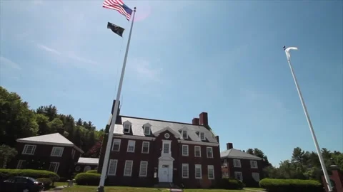 Flags Wave Over Massachusetts State Police Barracks At Quabbin Reservoir Stock Footage 329800885