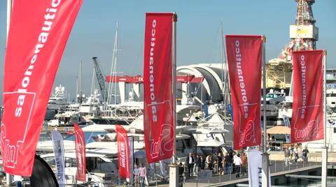Flags waving during Genoa Boat Show Stock Footage 58660937