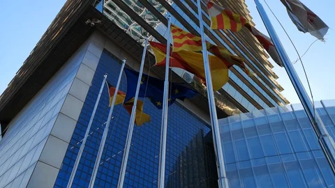 Flags waving in front of the German Consulate in Barcelona, Spain Video stock 93857825