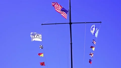 Flags waving at Progressive Norwalk Boat Show Stock Footage 213636731