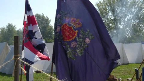 Flags waving with tents Stock Footage 168095295