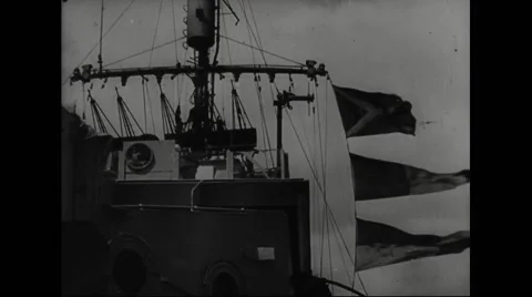 Flags waving on warship Stock Footage 44573869