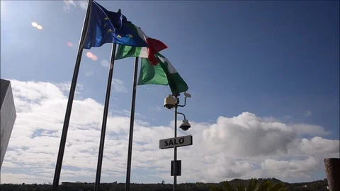 Flags waving in the wind in salò Stock Footage 88466827