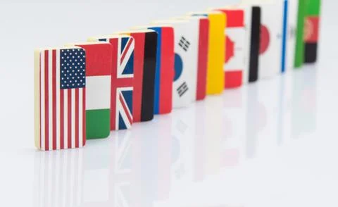 Flags on white surface Stock Photos