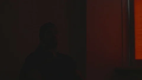 Flahing light in room pf brain function examination. Mature man sits on chair Video stock 127283078