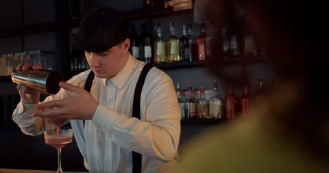 Flair Infused Elixir: A Bartender's Tale of Cocktails and Charm Stock Footage 243455137