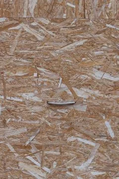 Flakeboard type of engineered wood background pattern Stock Photos