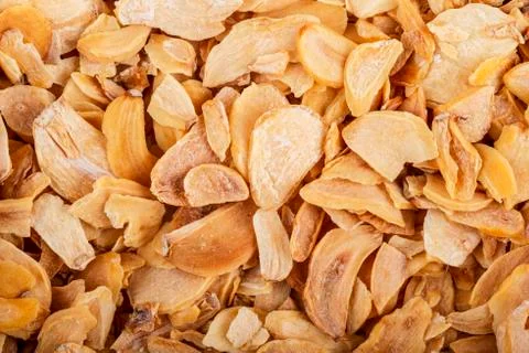 Flakes of dehydrated garlic Stock Photos