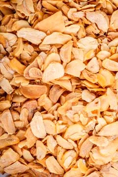 Flakes of dehydrated garlic Stock Photos