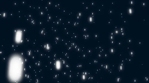 Flakes floating in the air on a black background Stock Footage 128559077