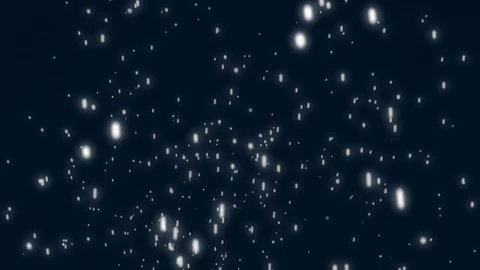 Flakes floating in the air on a black background Stock Footage 128559620