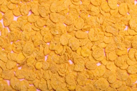 Flakes scattered on the background. Cornflakes. Background for text. Backgrou Stock Photos