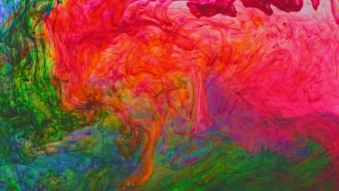 .The flakes of various colored powder dissolved in water migrated together. Vidéo 247019531