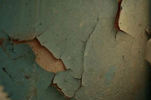 Flaky blue paint on the wall. Stock Photos