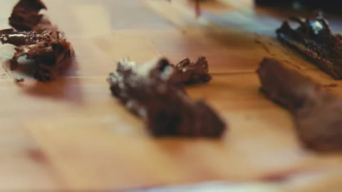 A Flaky chocolate on counter Stock Footage 274629132