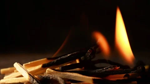 Flame and smoke on a dark background. Fireplace. Burning match Stock Footage 130389485
