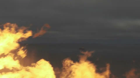 Flame and splashes of water Fire on background of sky and sea. Fire drills Stock Footage 208959920