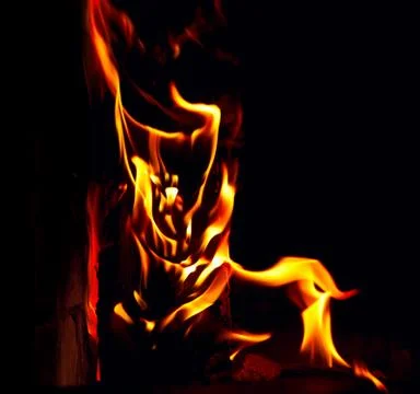 Flame on black background Stock Photos