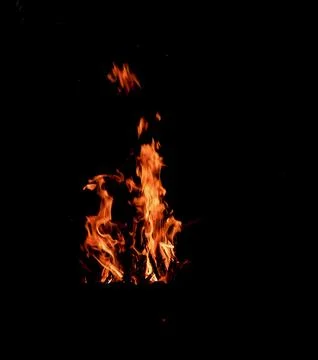 Flame on black background Stock Photos