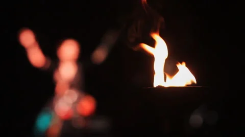 Flame On Blurred Background Of Dancing Women Stock Footage 55629213