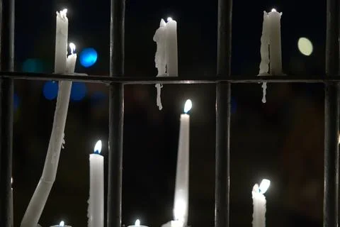 Flame of burning candeles in the night 스톡 사진