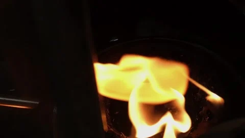 A flame burns in slow-motion Stock Footage 208837639