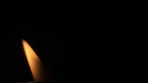 Flame of Candle Burning in Dark place Vídeo Stock 125396940