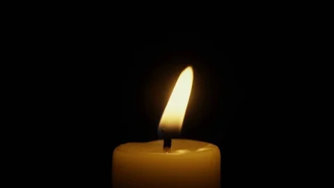 The flame of a candle swayed in the wind. Slow motion Stock Footage 74522553