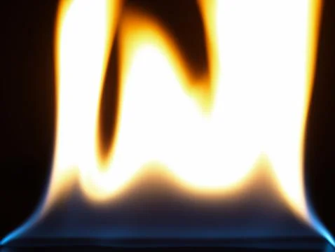 Flame close up on black background. Stock Photos