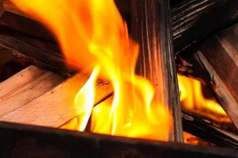 Flame devouring wood sticks Stock Photos
