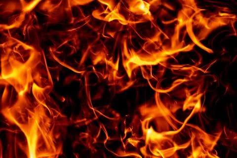 Flame fiery effect on black. Flame sparks and glowing particles. Flame texture Stock Photos