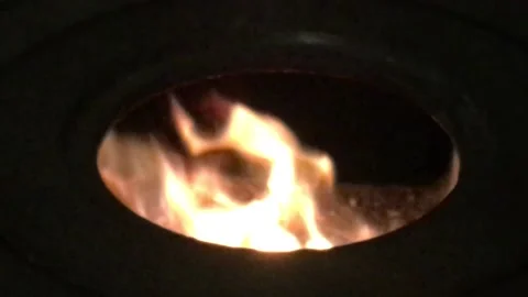 Flame of Fire Actively burning in the Round Circle of a Stove Hole 5 Stock Footage 168014107