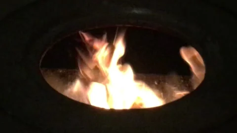 Flame of Fire Actively burning in the Round Circle of a Stove Hole 6 Stock Footage 168014129