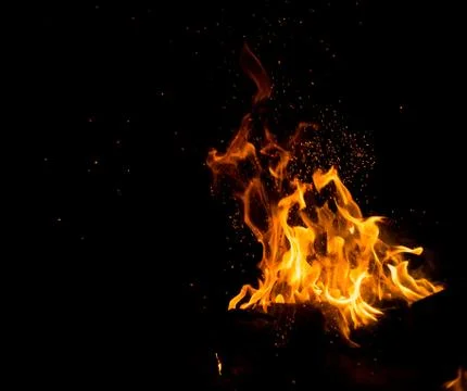 Flame of fire on a black background Stock Photos
