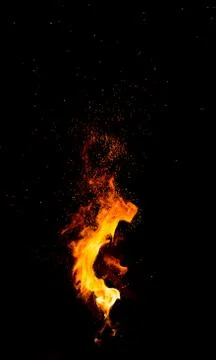 Flame of fire on a black background Stock Photos
