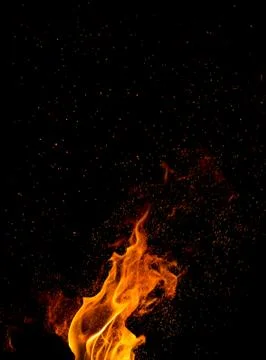 Flame of fire on a black background Stock Photos
