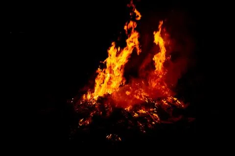 Flame of fire on a black background Stock Photos