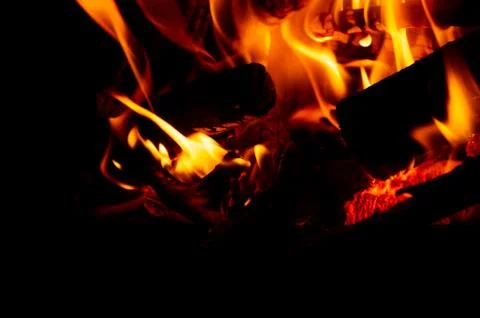 Flame of fire on a black background Stock Photos